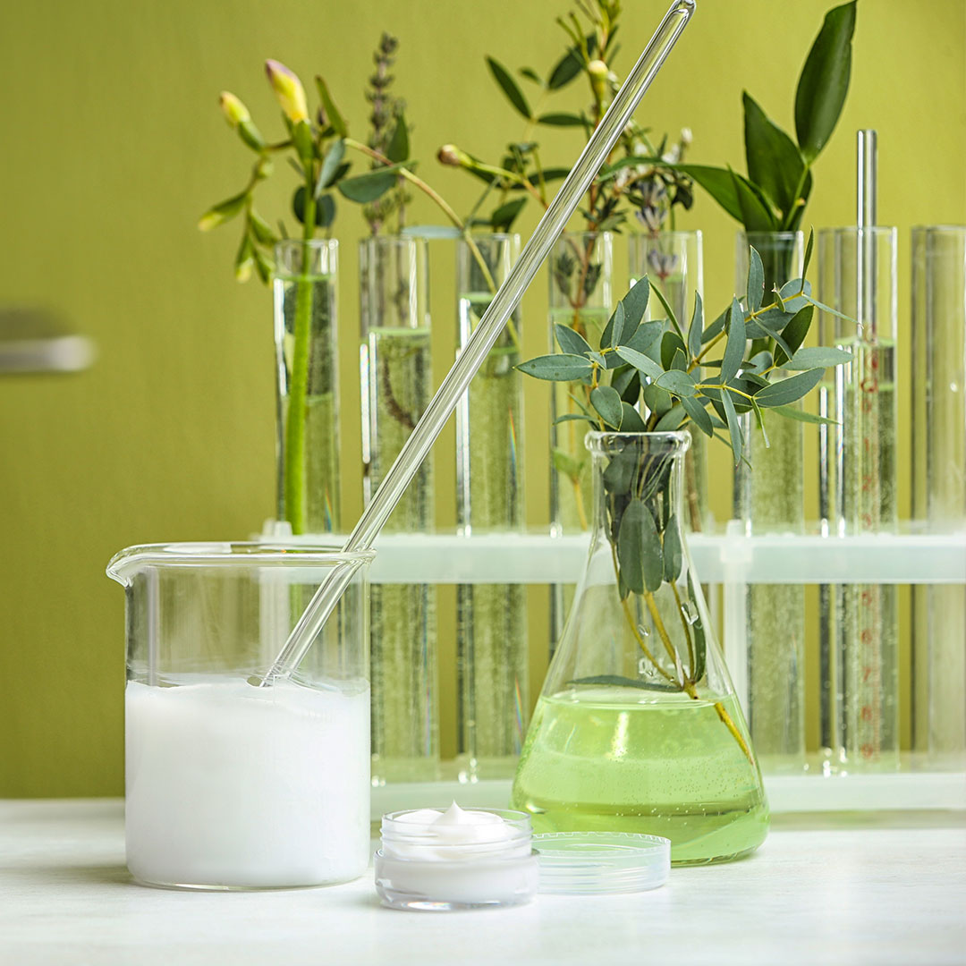 Laboratory glassware with green botanicals